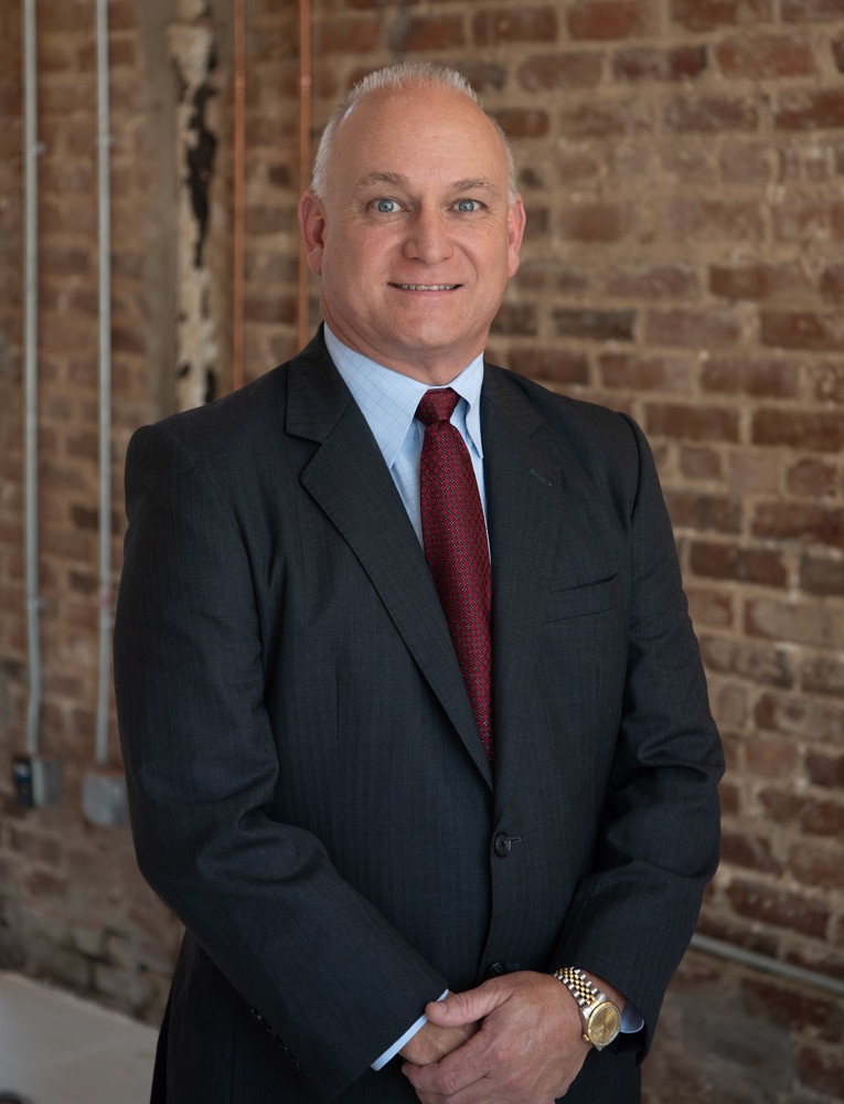 a man wearing a suit and tie